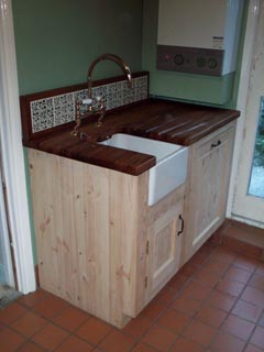 Free standing kitchen with Iroko worktop.