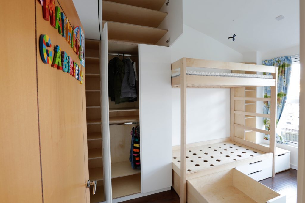 Buck beds made from sustainable sourced softwood, wardrobe cupboards and draws